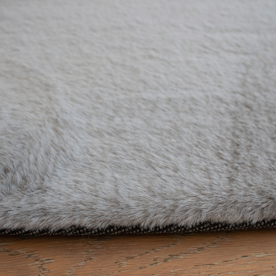 Rabbit Smoke Gray Faux Fur Area Rug - Plush and luxurious smoke gray faux fur rectangular rug from the Rabbit collection by LA Rug Linens. Available in various sizes. Made of polyester. Perfect for adding warmth and elegance to any room in your home.